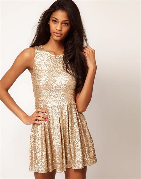 gold sequin dress dressed  girl