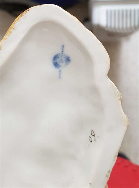 antique porcelain figurines marks