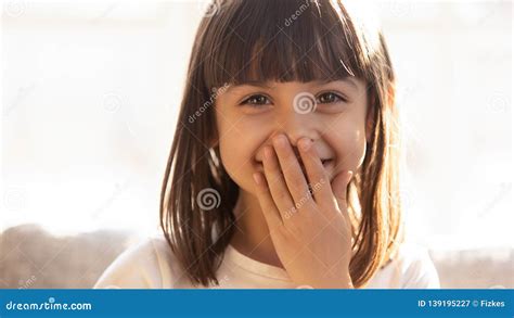 Funny Shy Girl Laughing Covering Mouth With Hand Headshot Portrait