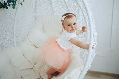 girl sitting   chair stock image image  pink happy