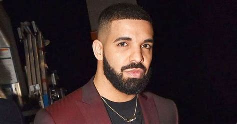 Drake Sparks Pregnancy Rumors As He Poses With A Mystery Woman