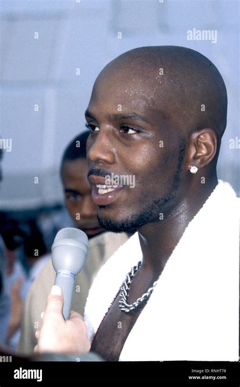 rapper dmx is shown being interviewed before his set at woodstock 99