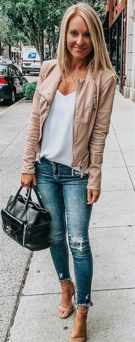 Brown Leather Jacket White Top Blue Skinny Jeans And Pair Of Sandals