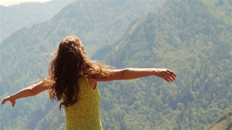 woman enjoying scenic view stretching on stock footage sbv 318305126