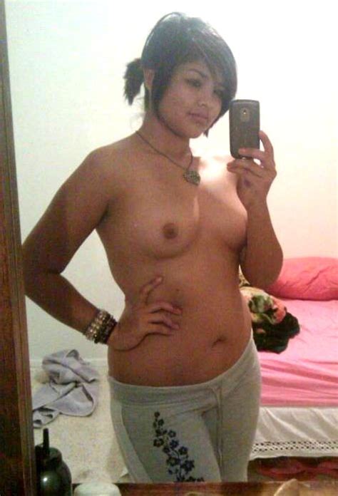 chubby latina taking a cute topless selfshot pic