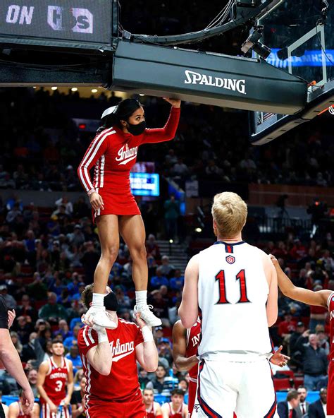 indiana cheerleaders save march madness game by retrieving stuck ball
