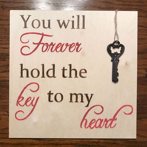 hold  key   heart valentines day sign https