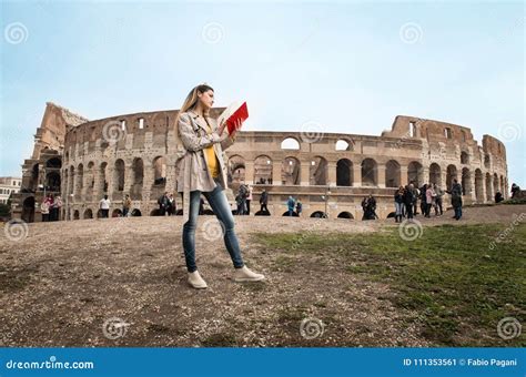 tourist woman reading travel book  colosseum monument  rome stock image image  roman