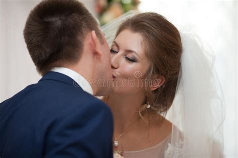 Elegant Stylish Groom With His Happy Gorgeous Brunette Bride On Stock