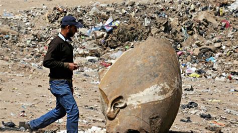 massive pharaoh statue found in cairo slum