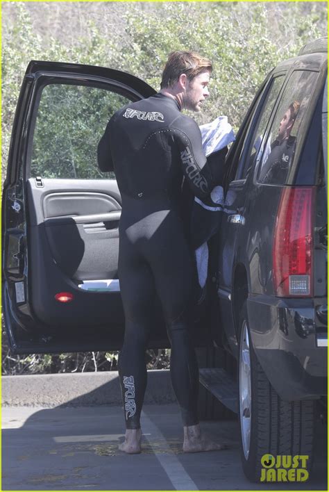 chris hemsworth s muscles bulge out of his tight wetsuit photo 3068871