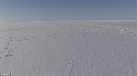 U S Naval Submarine Smashes Through The Ice In The Arctic