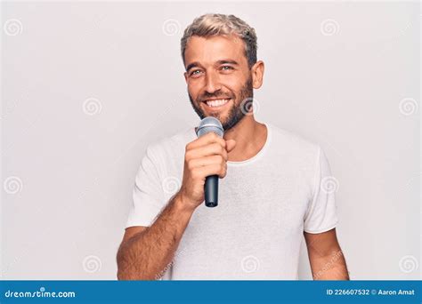 Handsome Blond Singer Man With Beard Singing Song Using Microphone Over