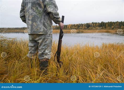 hunter   gun autumn duck hunting stock image image  weapon sport