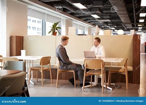 young businessman  informal interview  cafeteria area