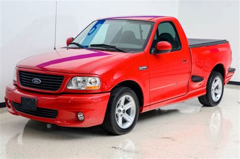 sale  ford   svt lightning bright red supercharged