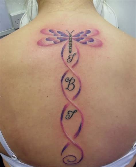 Feminine Butterfly Tattoo On Upper Back
