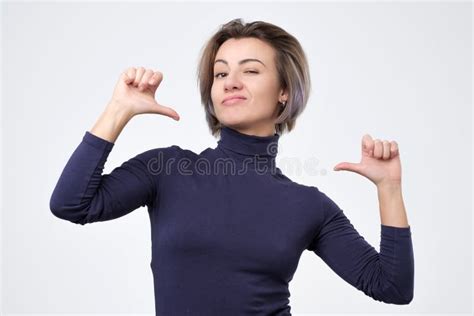 Woman Looking Confident With Smile On Face Pointing Herself With