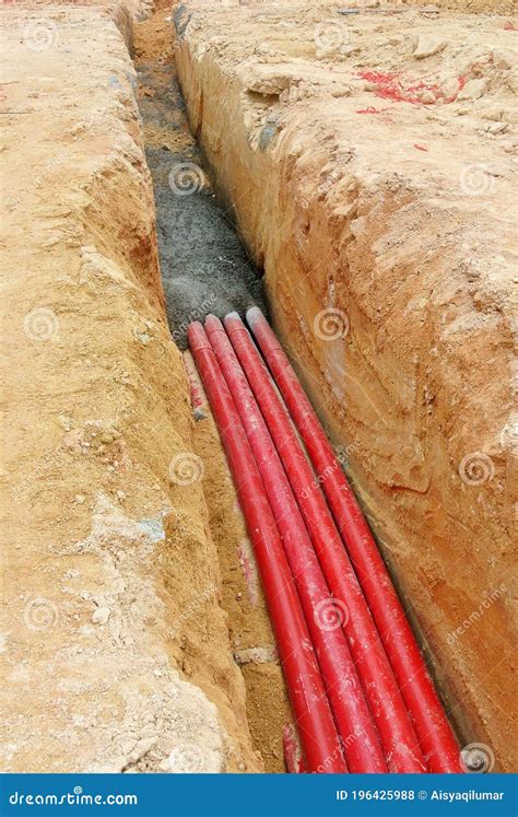 hdpe conduit pipe power conduit installed   ground trench editorial stock photo