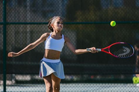 girl playing tennis  stock photo