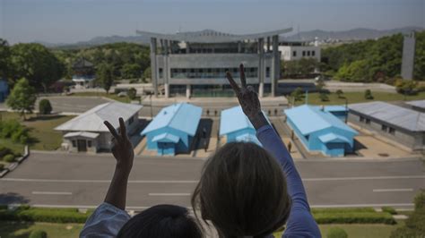 peace activists cross demilitarized zone separating koreas   york times