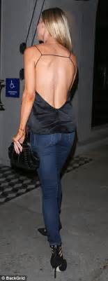 joanna krupa flaunts her enviable figure in a backless top daily mail