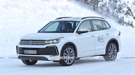 bigger rounder  volkswagen tiguan    shrunken touareg