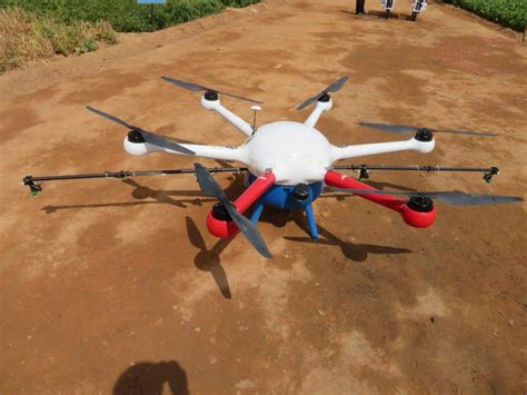 drone  spray pesticides  built  students   farmers   health hazards