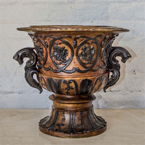 bronze greco roman urn  serpent handles randolph rose collection