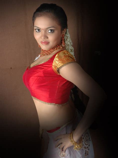 Nikhisha Hot Tamil Actress Sexy Item Dancer Seducing In