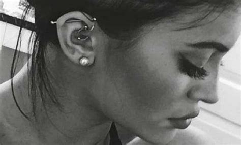 check out kylie jenner s new ear piercing