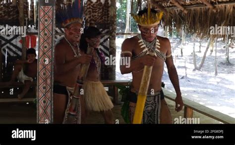 native brazilians doing their ritual at an indigenous tribe in the