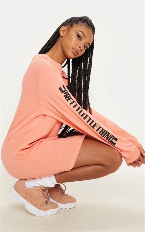 prettylittlething pale coral oversized long sleeve t shirt dress