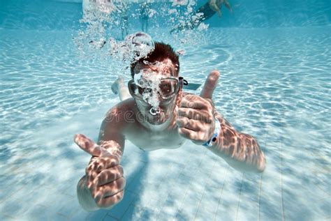 man floats  pool stock image image  goggles sport