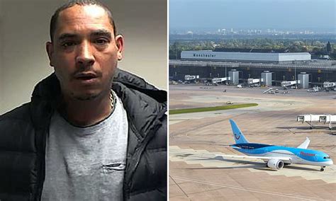 drunken abusive passenger who tried to open a plane door mid flight is