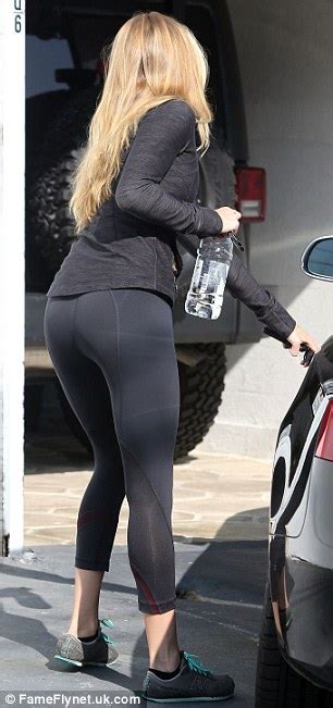 sofia vergara and rosie huntington whiteley go head to head as they flaunt their curves in lycra