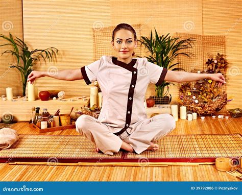 bamboo massage  spa  woman stock photo image  hotel massage