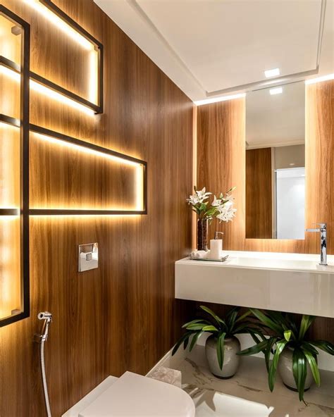 lavabo  paredes revestidas de madeira  iluminacao decorativa decor salteado
