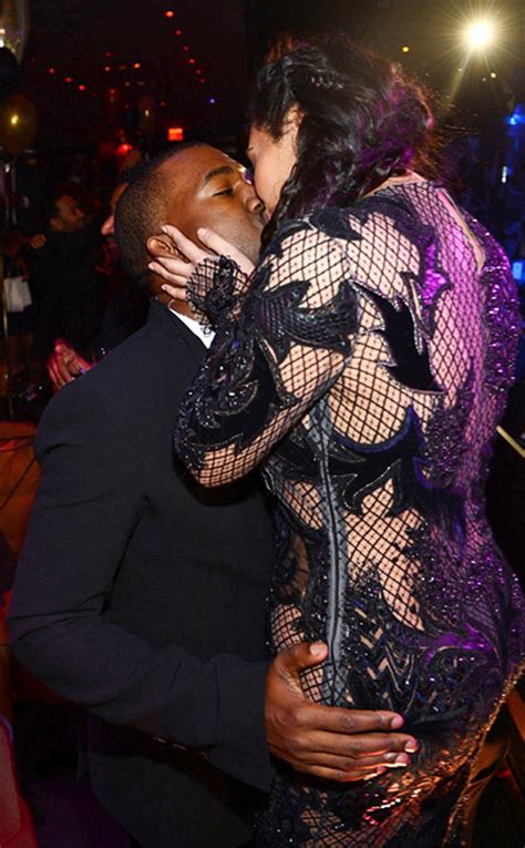 Pregnant Kim Kardashian Gives Kanye West A Big Kiss On New Year S Eve