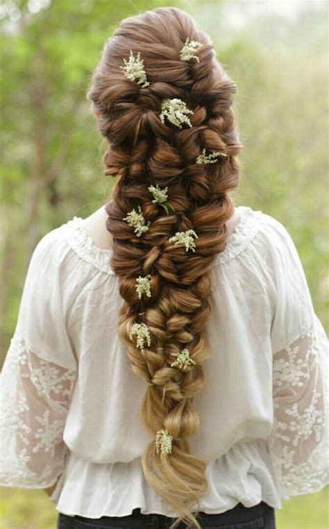 medieval inspired braided hairstyle  flowers  beautiful