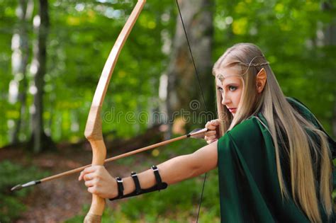 Beautiful Female Elf Archer In The Forest Hunting With A