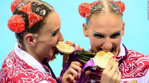 here s why olympic athletes bite their medals while posing