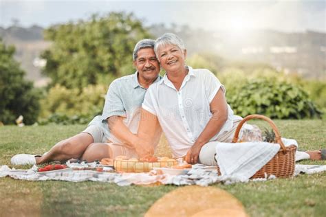 ready to enjoy the twilight years a mature couple enjoying a picnic