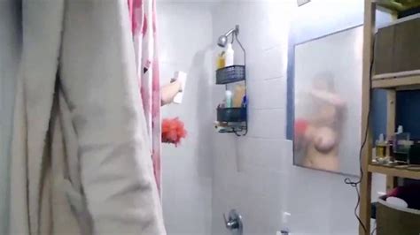 step mom caught son jerking off while looking her bathing