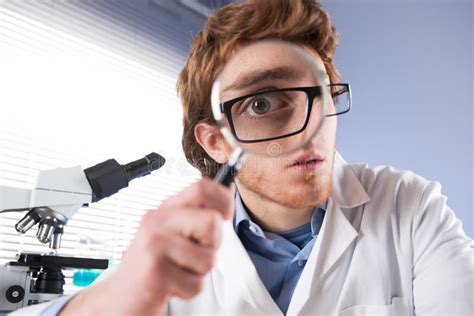 young researcher  magnifier stock photo image  medical