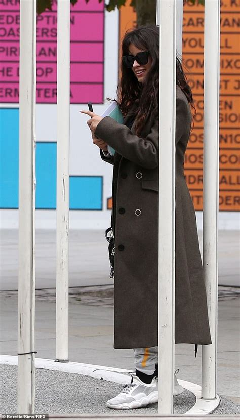 camila cabello larks around on a swing and snaps selfies during casual day in london daily