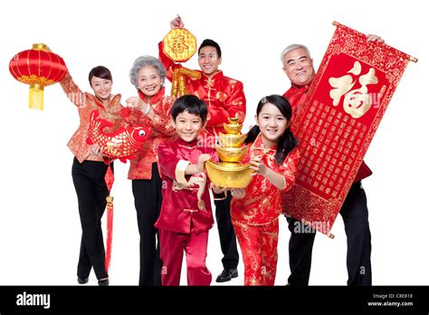 family dressed  traditional clothing celebrating chinese  year