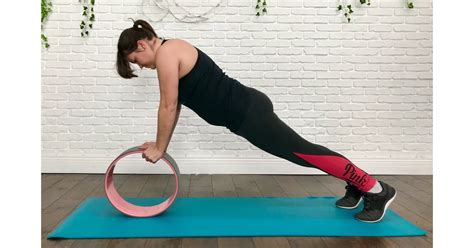 Plank Pose How To Use A Yoga Wheel Popsugar Fitness