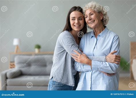 Grandma And Girl Smiling And Hugging Royalty Free Stock Image
