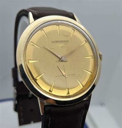 longines calibre   gold filled  reserve catawiki